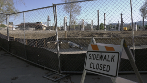 fencing and sidewalk closed sign at old orchard park in Newhall